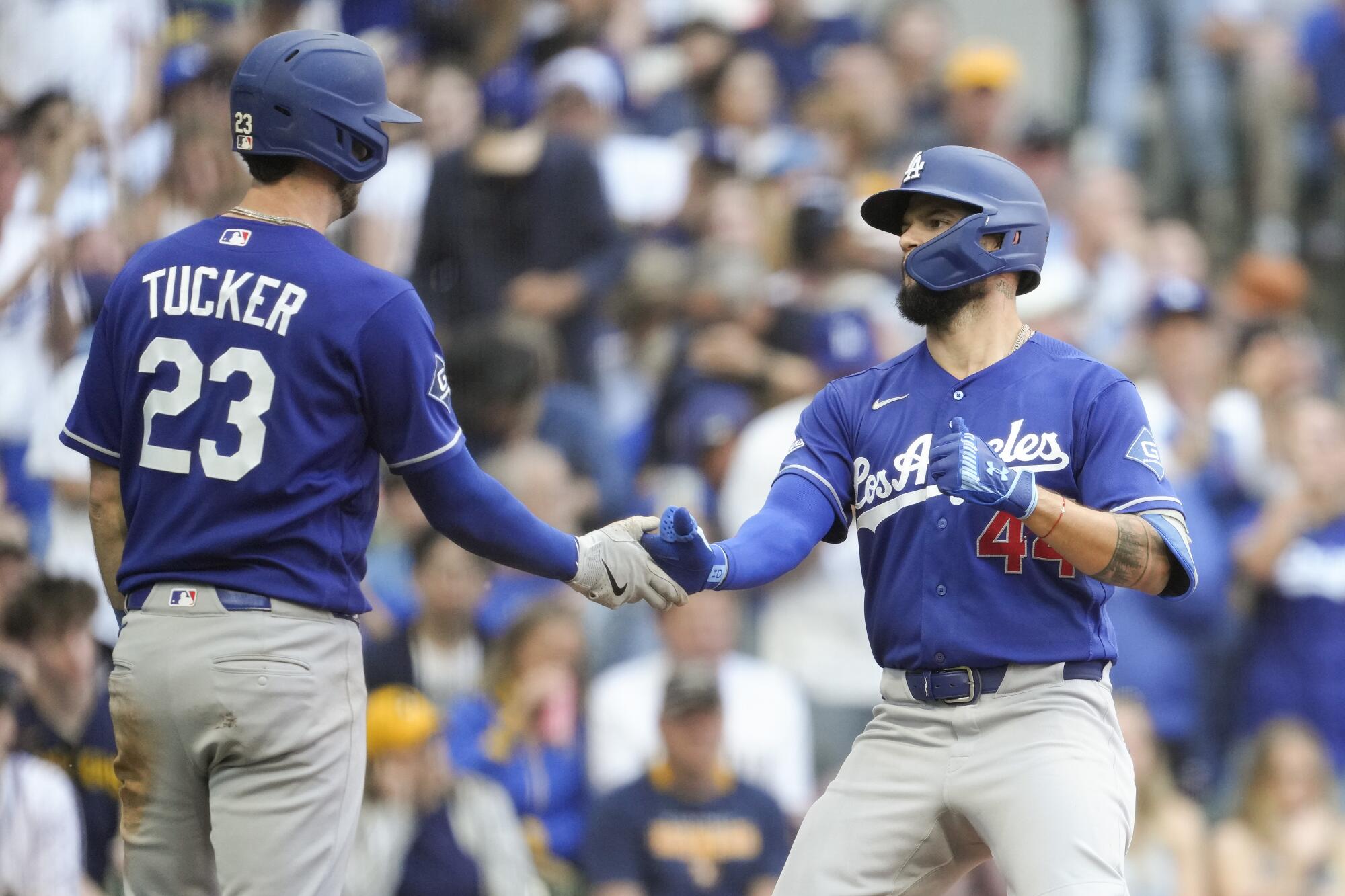 The Dodgers' Andy Pages celebrates his two-run home run with teammate Kyle Tucker during a win over the Brewers.
