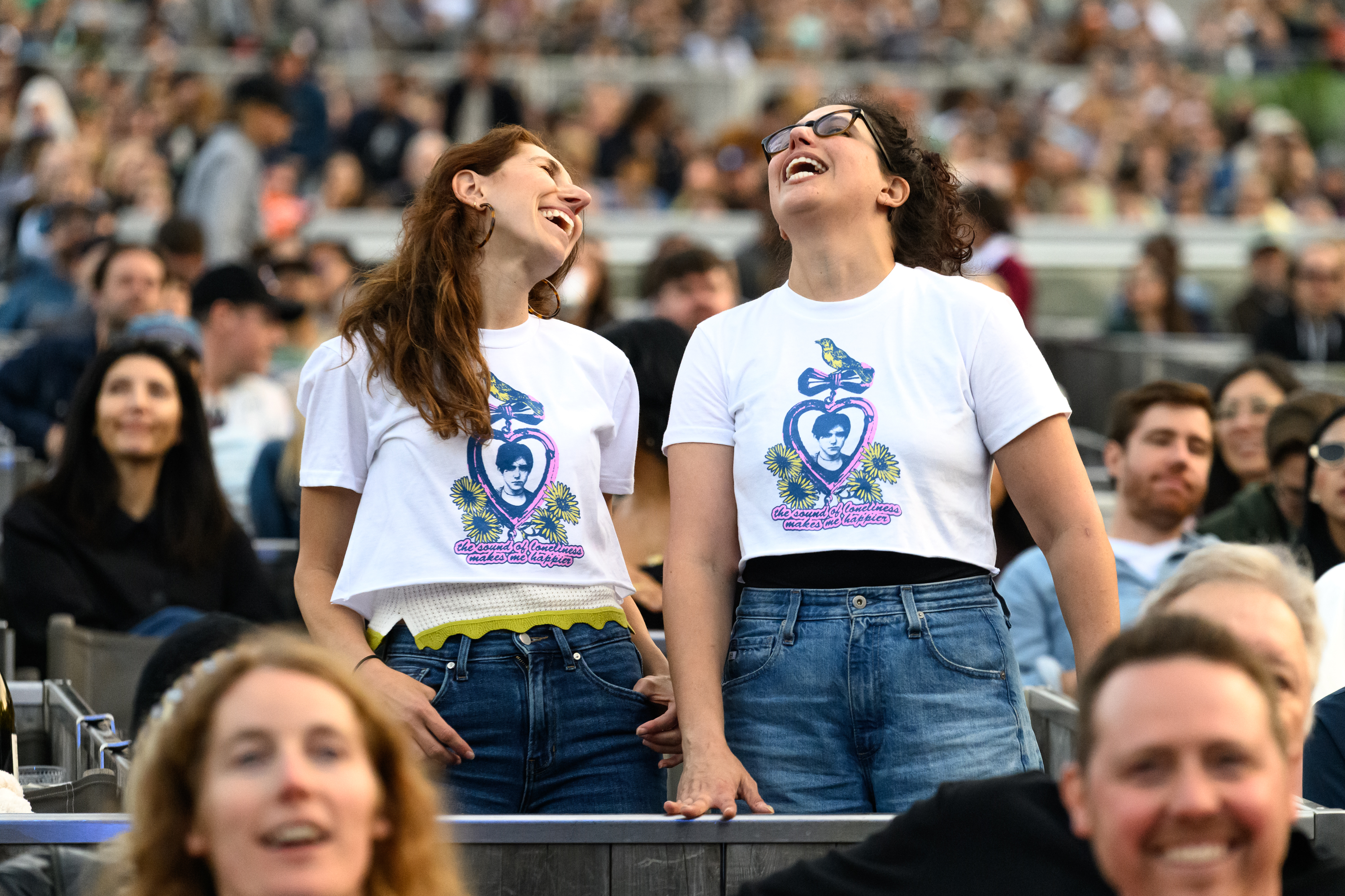 Fans sing along to Bright Eyes during their show at...