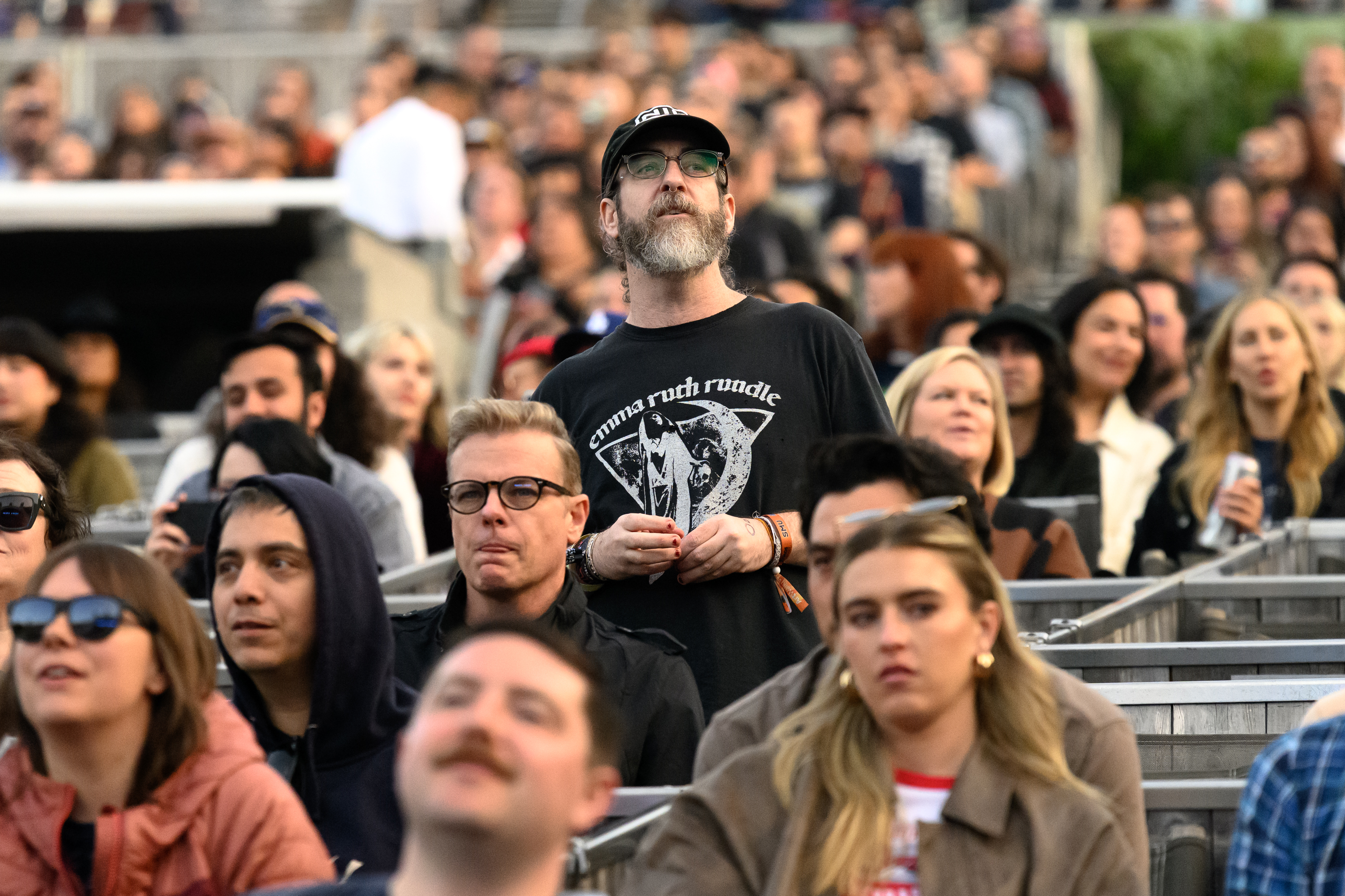 Fans sing along to Bright Eyes during their show at...