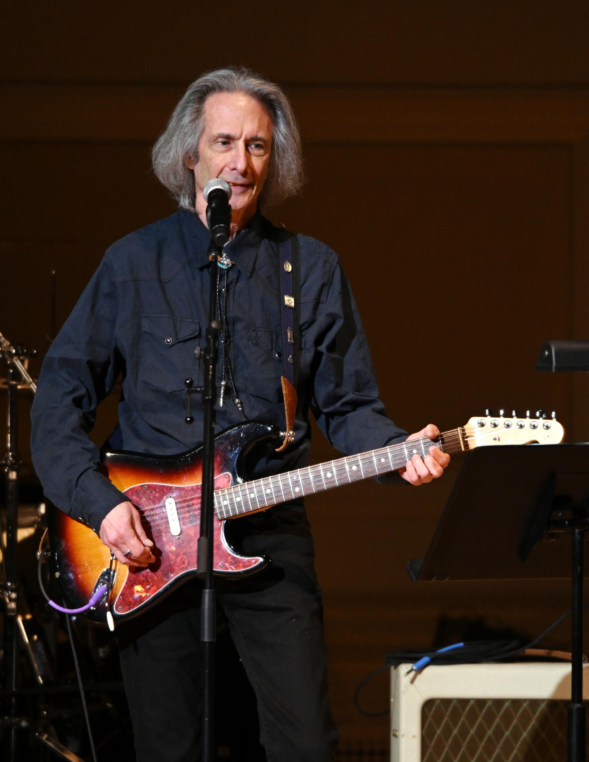Guitarist Lenny Kaye performs onstage at Carnegie Hall in 2023.