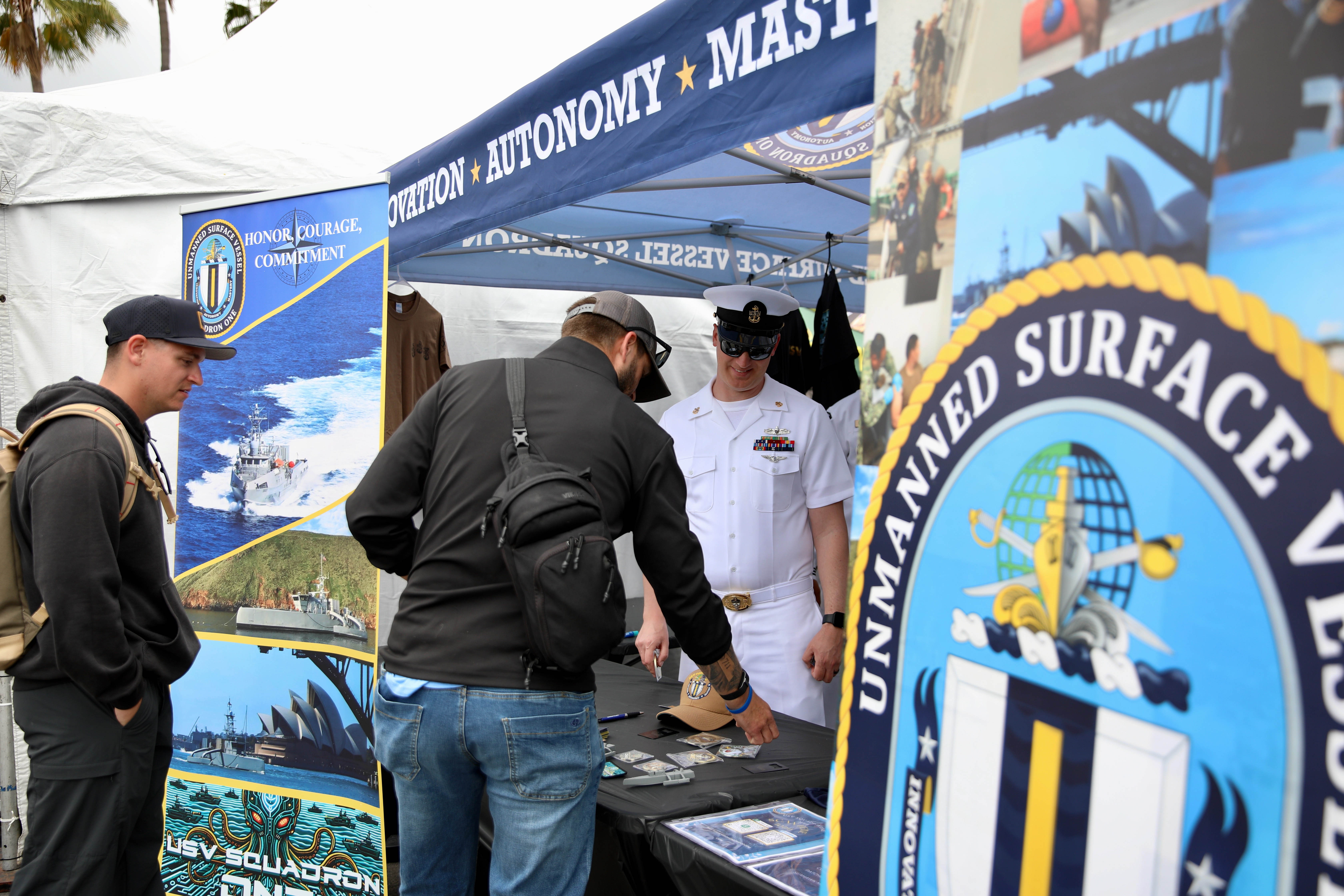Attendees have the opportunity to chat with military personnel on...