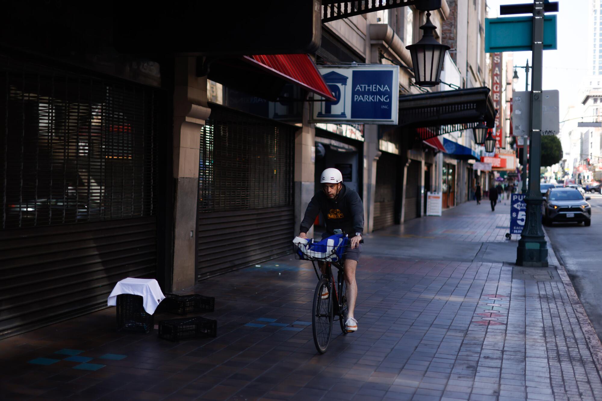 A bicyclist is in the 600 block of Broadway in downtown Los Angeles on May 22, 2026.
