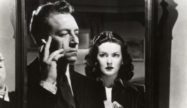 Paul Henreid and Joan Bennett in the 1948 film noir "Hollow Triumph," which features cinematography by John Alton.