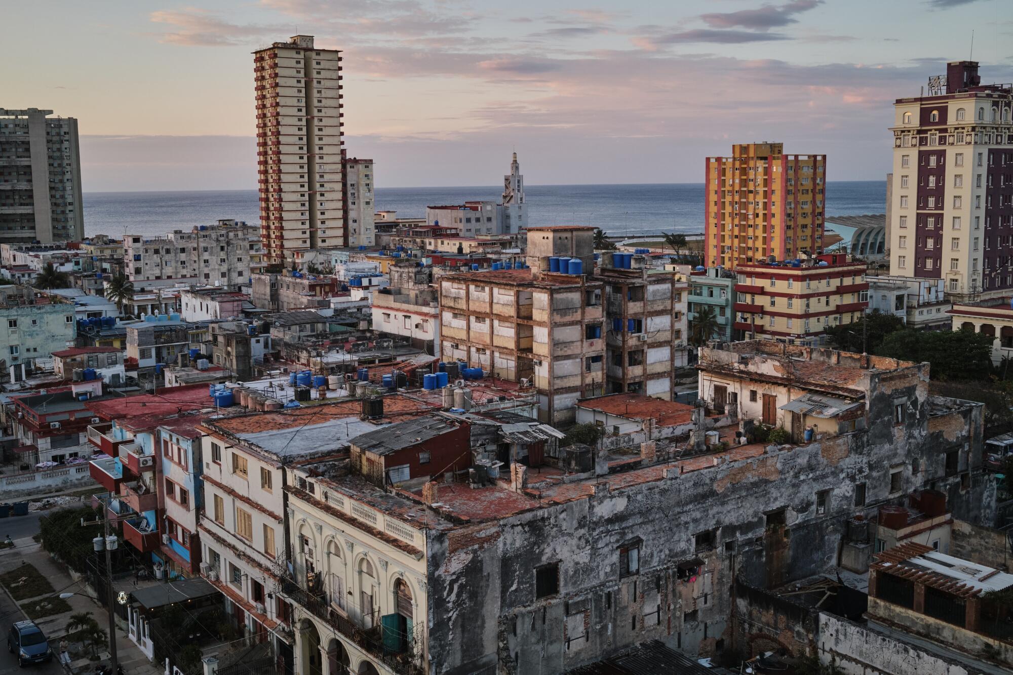 A bird's eye view of buildings, some showing their age