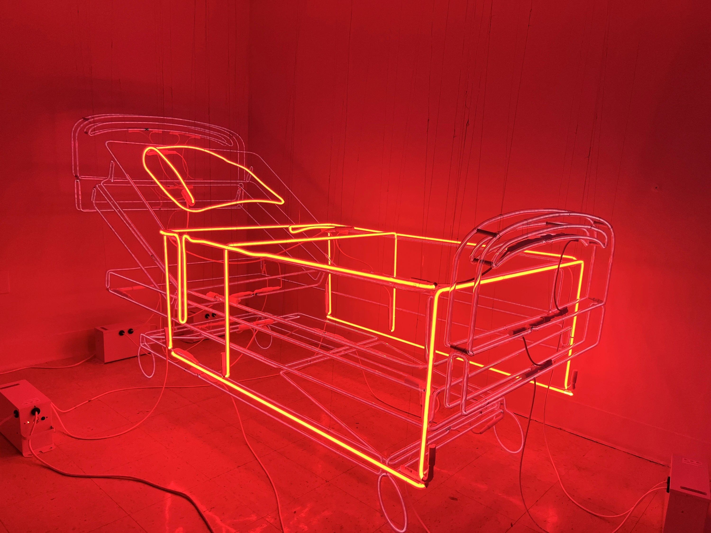 A hospital bed made from neon lights at Hospital of Emotions.