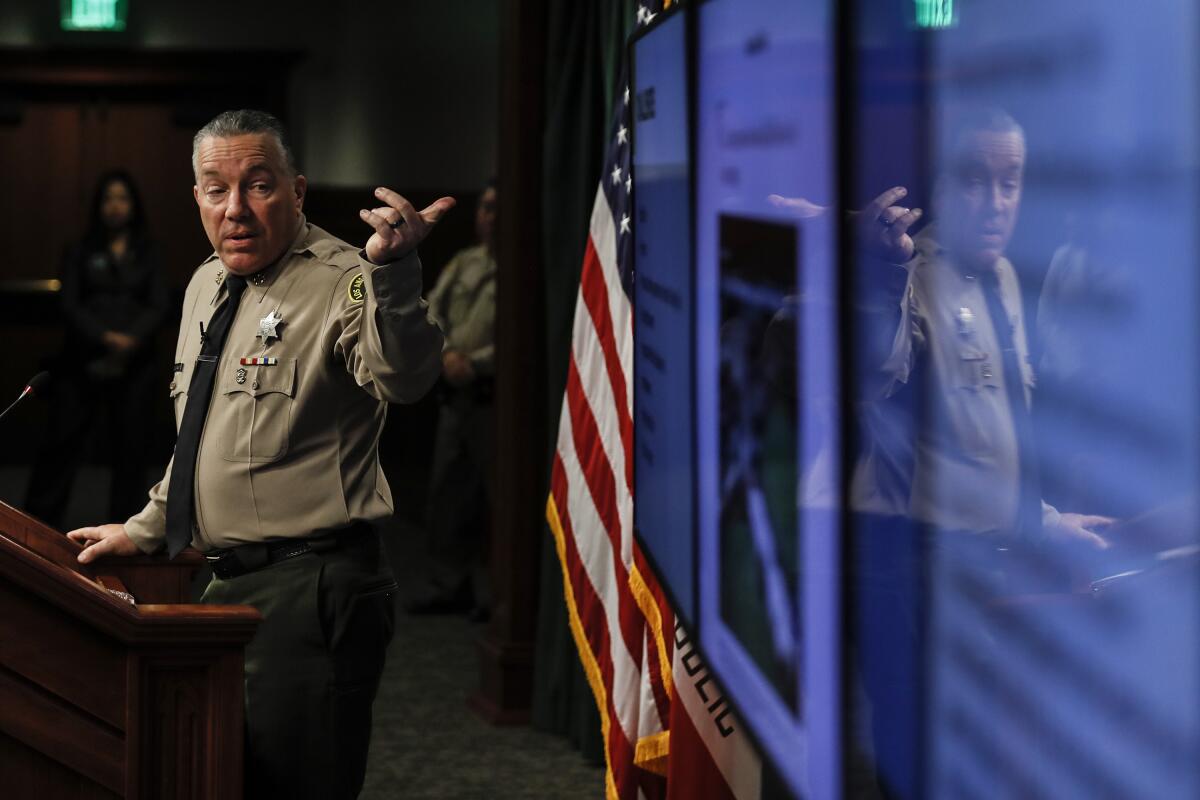 L.A. County Sheriff Alex Villanueva speaks during a news conference.