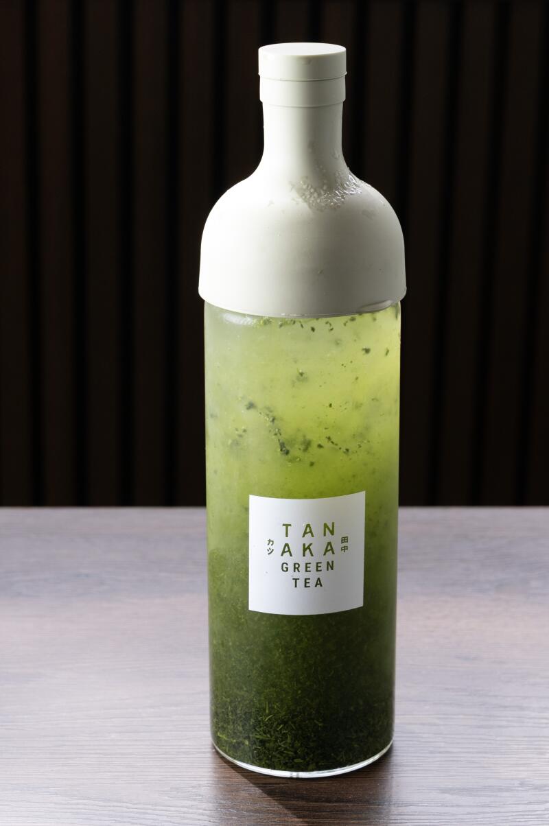 Bottle of Tanaka green tea at Ten No Meshi.