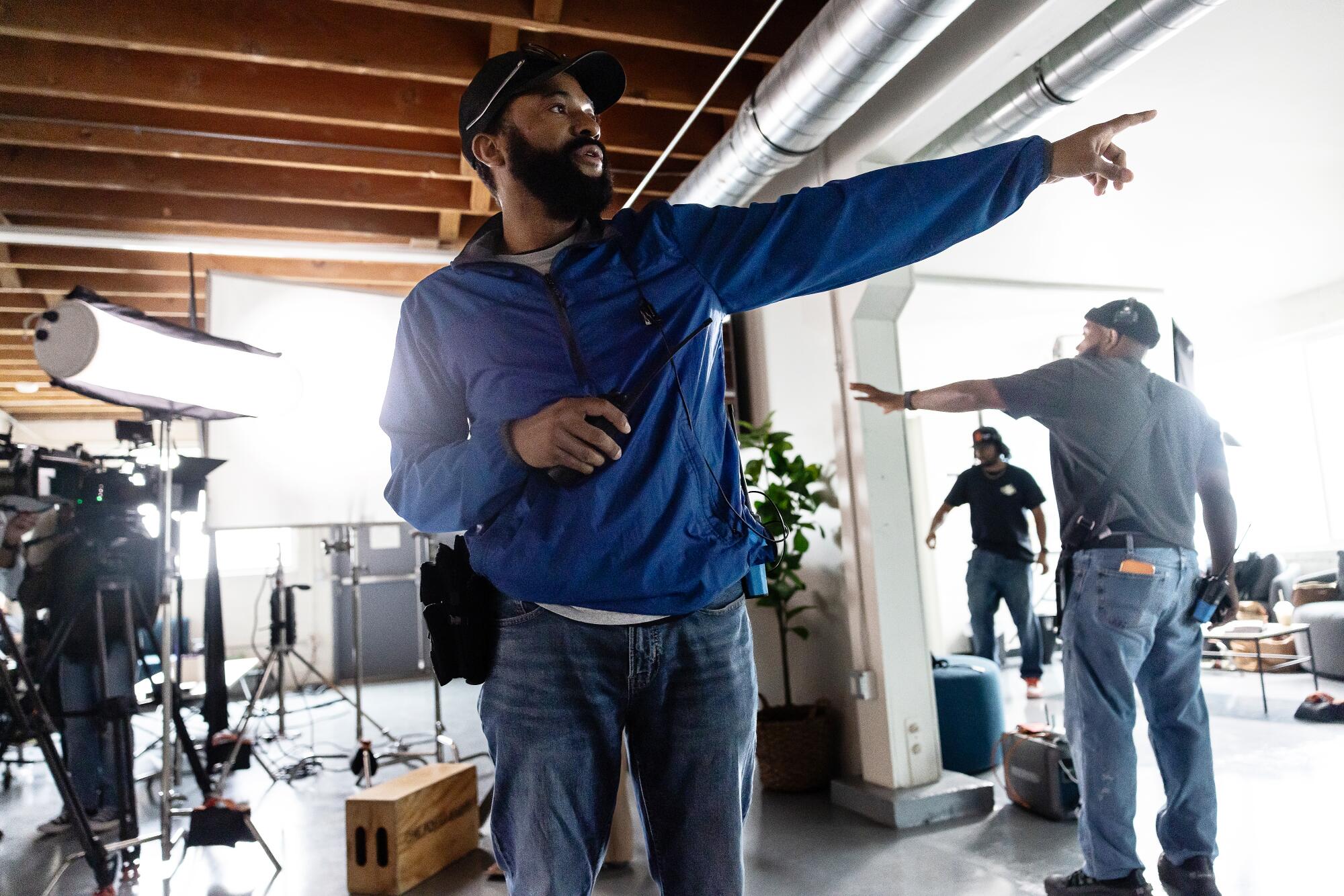 Assistant director Frederick Gourgue, center, works with the 'Screen Time' crew