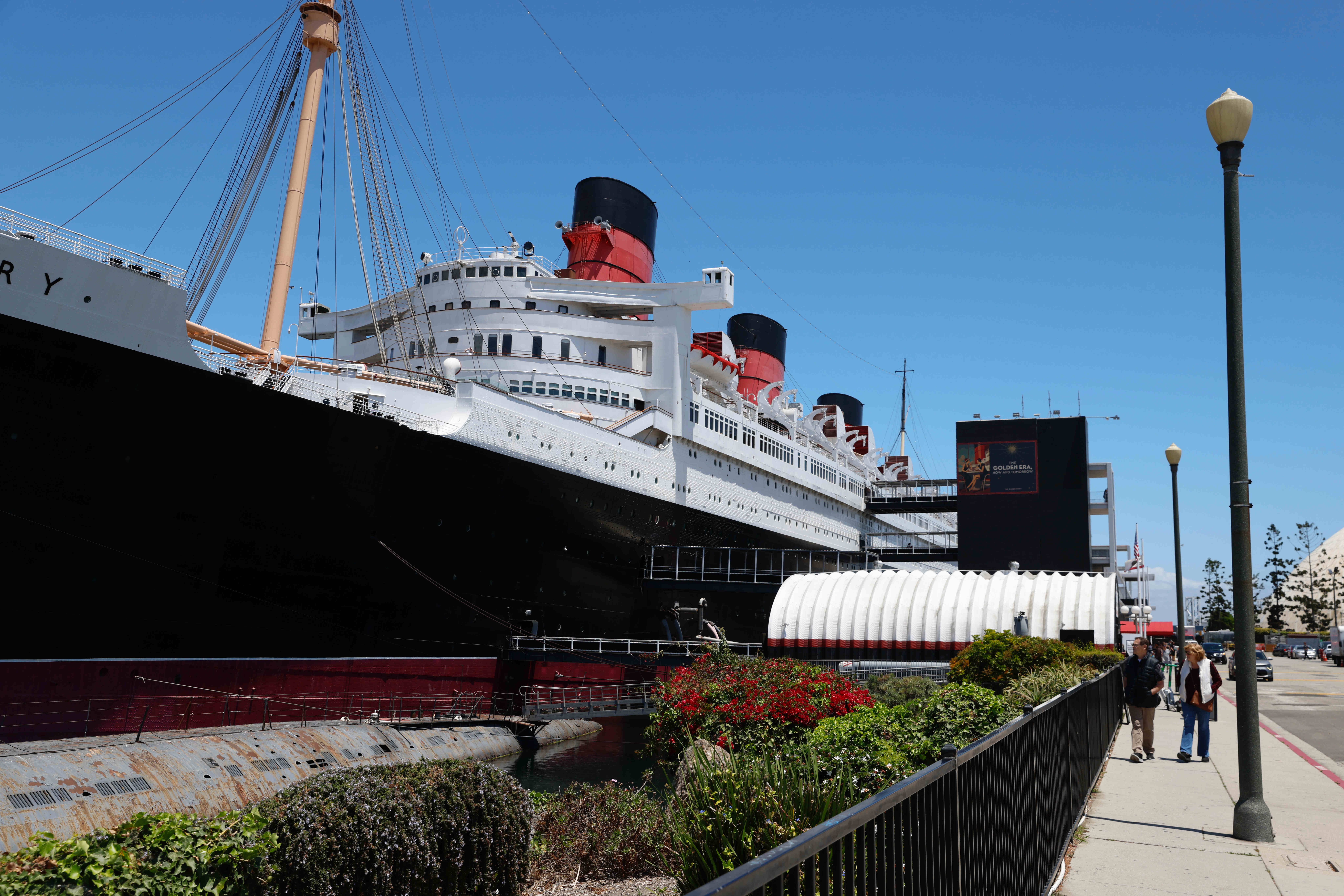 People visit the Queen Mary in Long Beach on Wednesday,...