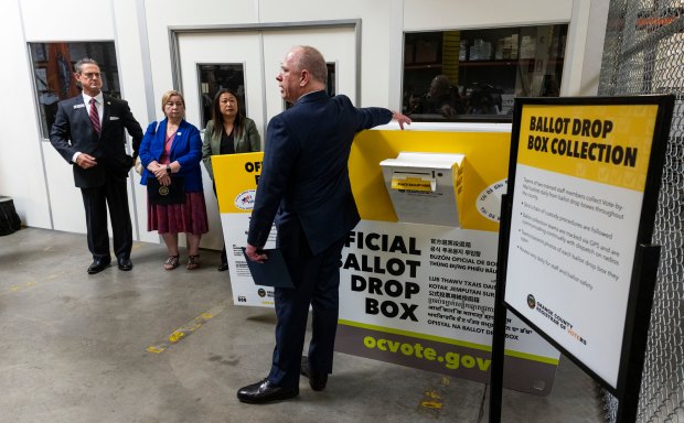 Orange County Registrar of Voters Bob Page talks about ballot drop boxes during a tour of the registrar's facility in Santa Ana on Wednesday, May 27, 2026. With Page were Orange County District Attorney Todd Spitzer, Christy McCormick, vice chair of the U.S. Election Assistance Commission and Orange County First District Supervisor Janet Nguyen, from left. (Photo by Paul Bersebach, Orange County Register/SCNG)