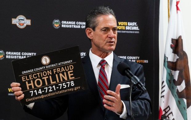 Orange County District Attorney Todd Spitzer speaks about the election fraud hotline during a tour of the Orange County Registrar of Voters in Santa Ana on Wednesday, May 27, 2026. Orange County Registrar of Voters Bob Page, Orange County First District Supervisor Janet Nguyen and Christy McCormick, vice chair of the U.S. Election Assistance Commission, were also on the tour. (Photo by Paul Bersebach, Orange County Register/SCNG)