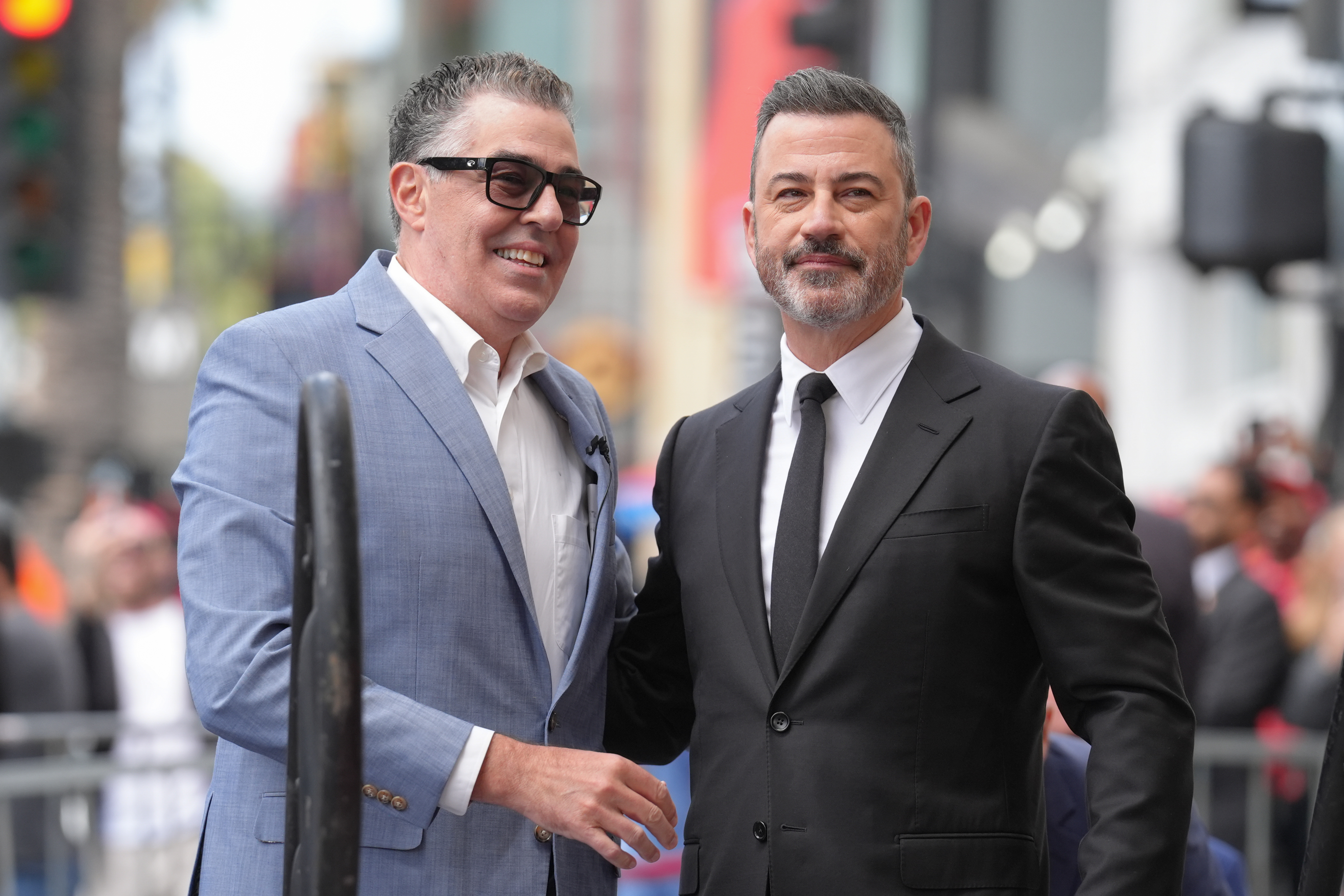 Adam Carolla, left, and Jimmy Kimmel attend a ceremony honoring...