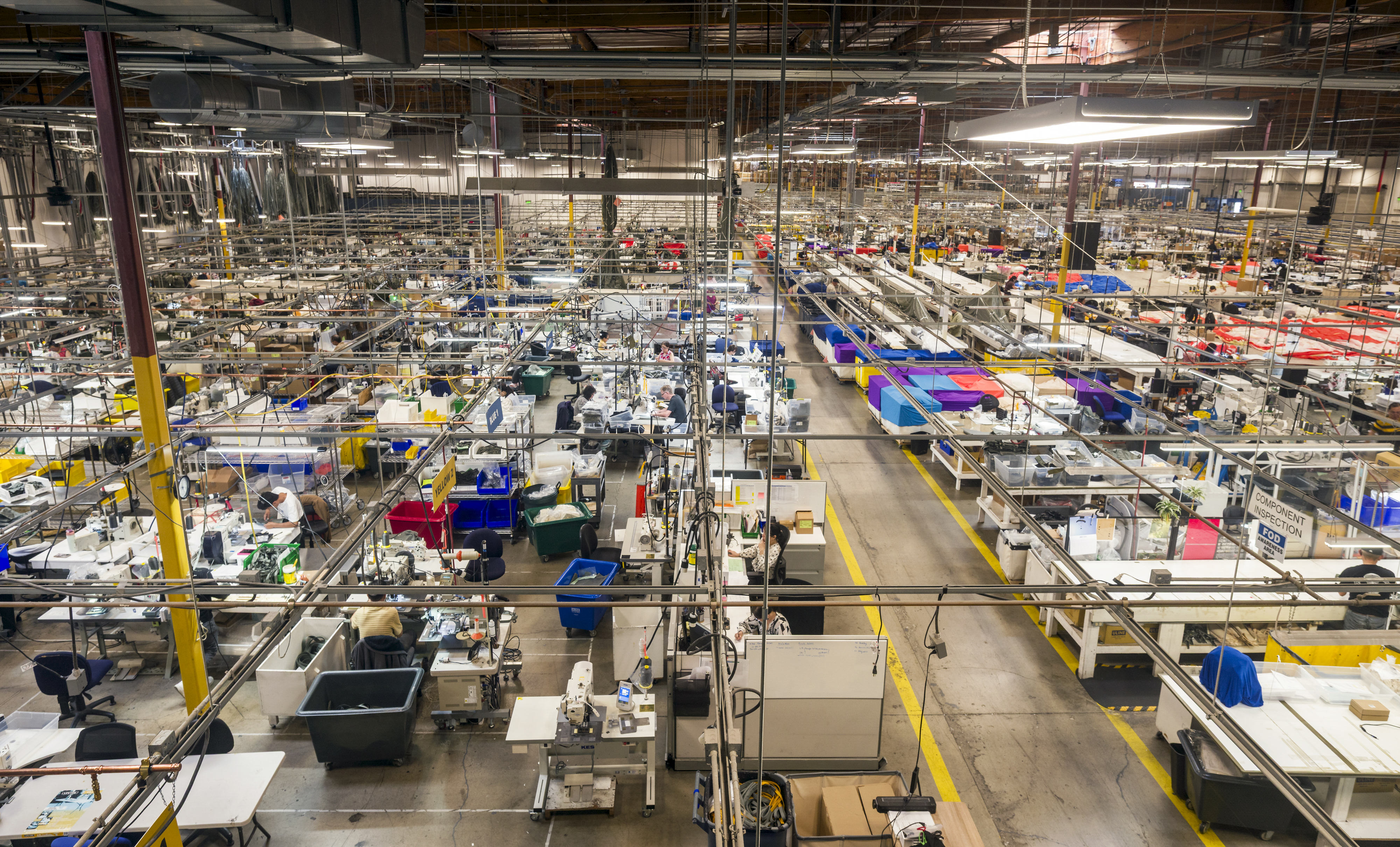 The 160,000-square-foot factory floor at Airborne Systems in Santa Ana...