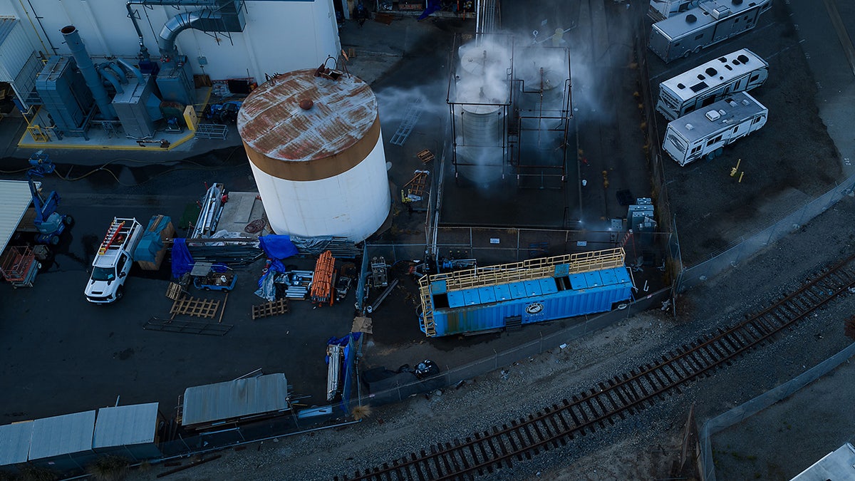 A tank being sprayed with water at an aerospace plant in Garden Grove, Calif.