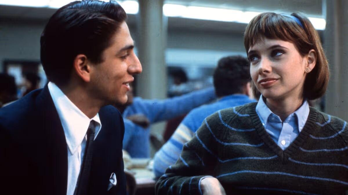 Two people flirt.
