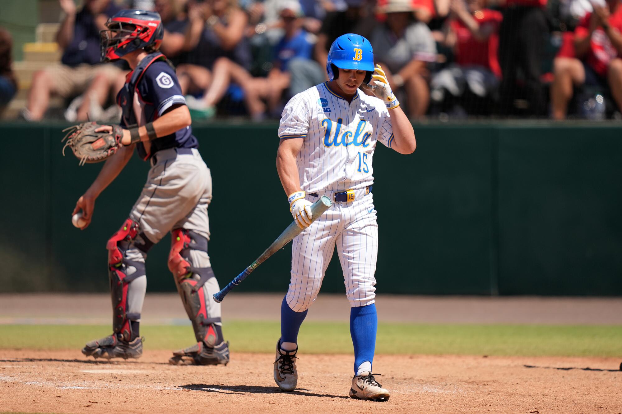 UCLA's Jarrod Hocking strikes out to end eighth inning during a 3-2 loss to Saint Mary's.