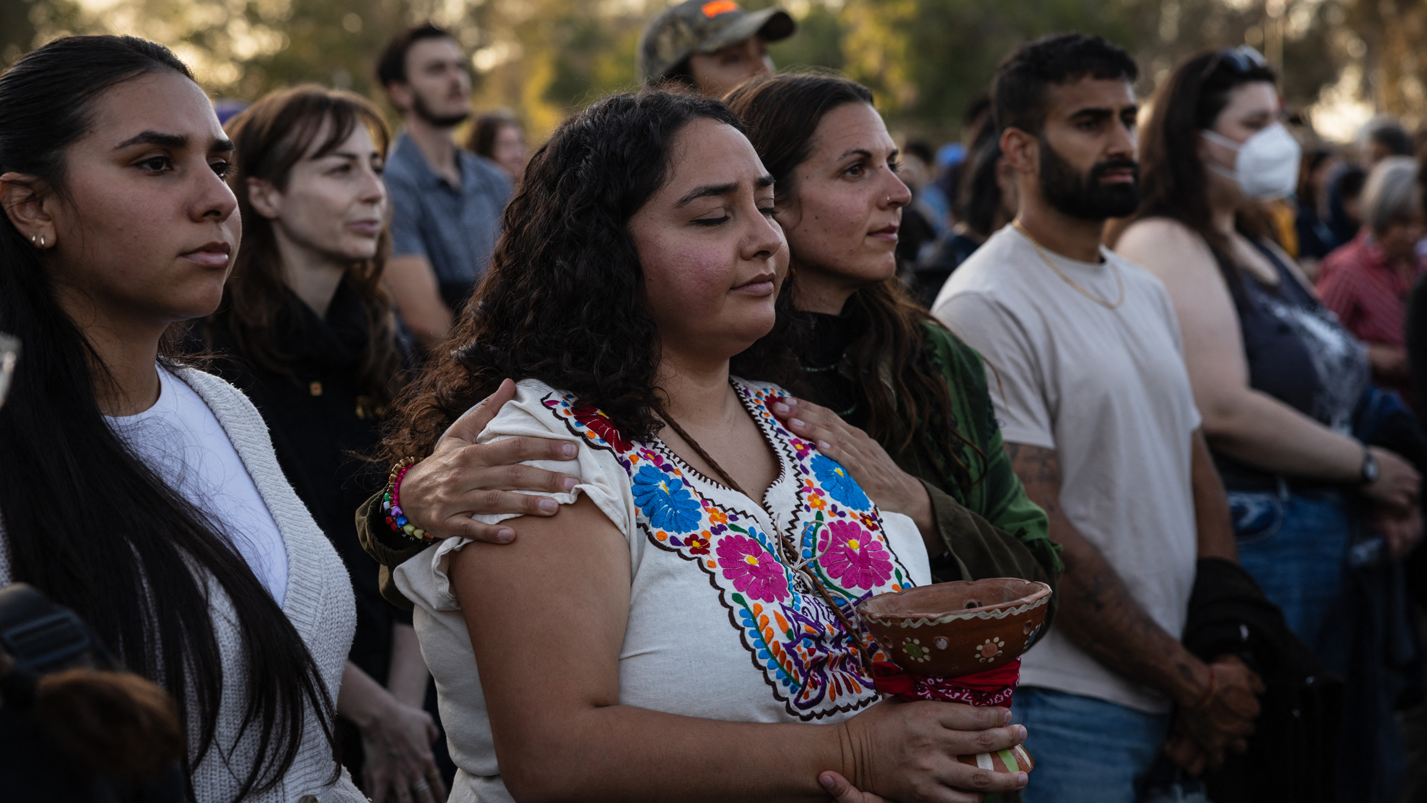 Community members gather at a vigil for victims and families of a shooting at the Islamic Center of San Diego, California, on May 19, 2026.