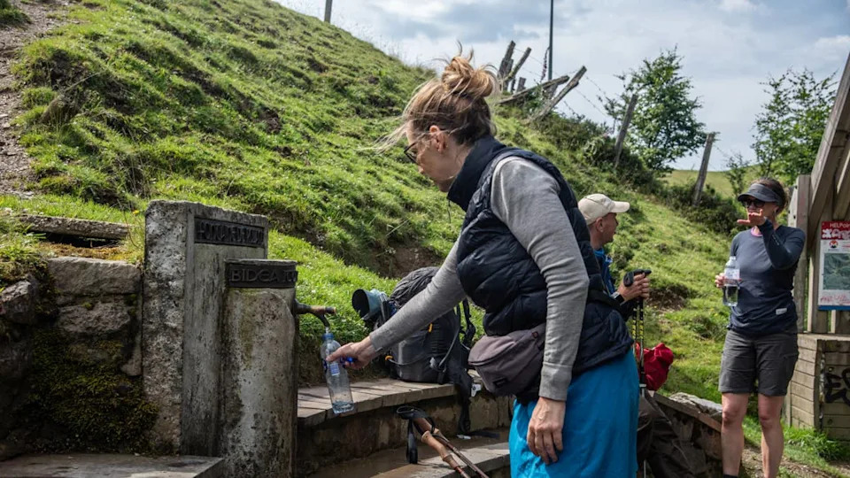 Shared water fountain on a popular hiking trail in the Pyrenees.<p>Getty Images</p>