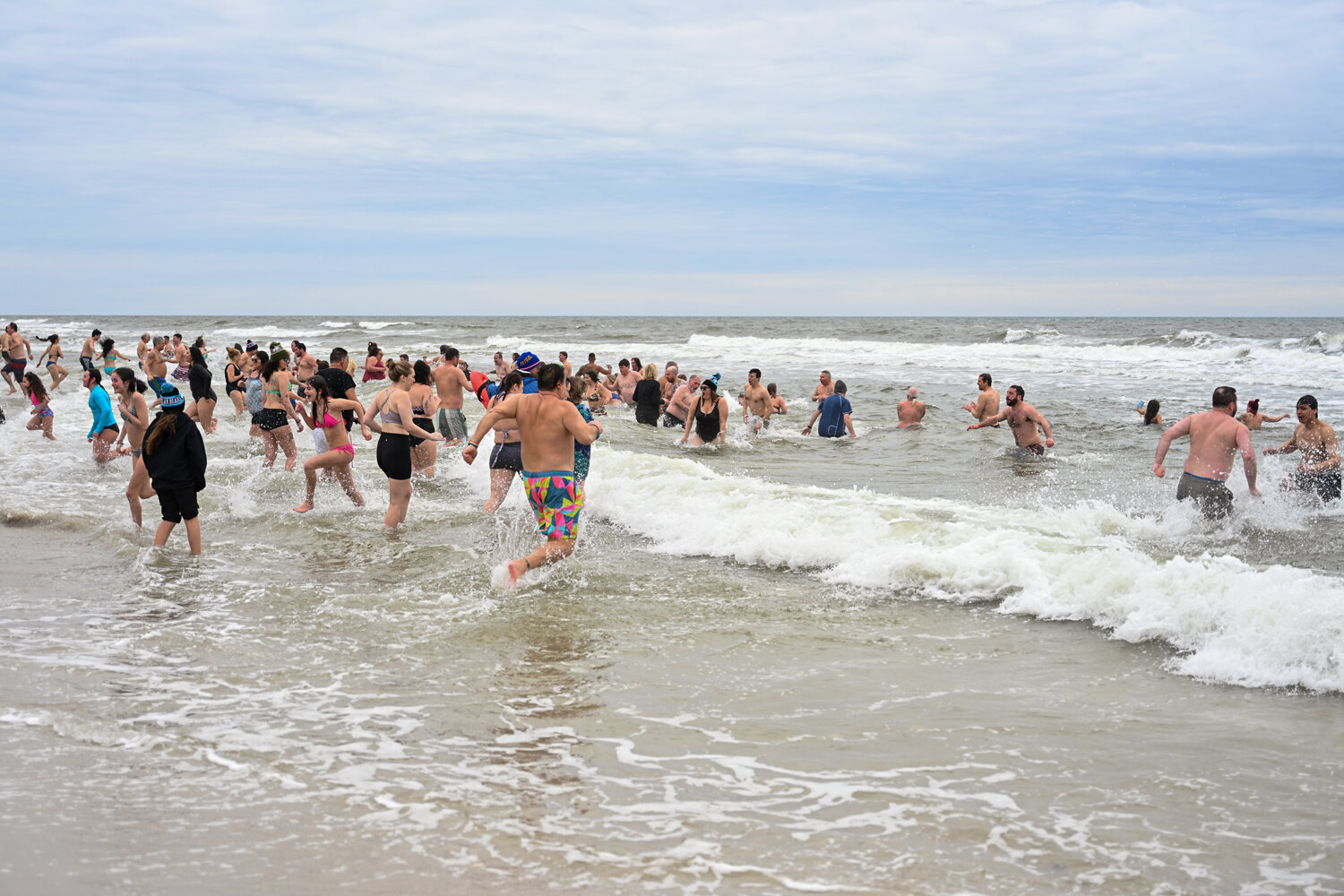 People of all ages dipped into ocean &mdash; some for their first Polar Bear Splash, some revisiting for years.