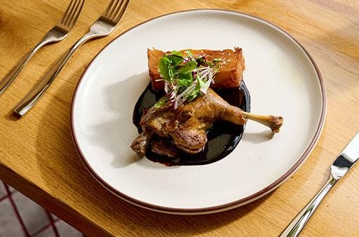 Duck leg confit with a black garlic mole at Alta Adams.