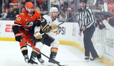 Vegas Golden Knights' Ben Hutton (17) and Anaheim Ducks' Chris Kreider (20) vie for t ...