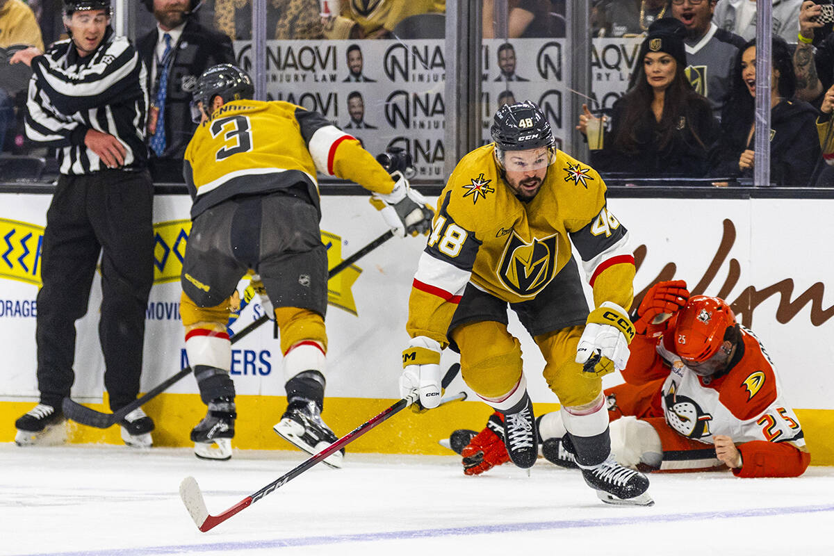 Golden Knights defenseman Brayden McNabb (3) collides into Anaheim Ducks center Ryan Poehling ( ...