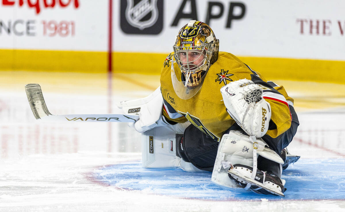 Golden Knights goaltender Carter Hart (79) stretches as he readies to battle the Anaheim Ducks ...