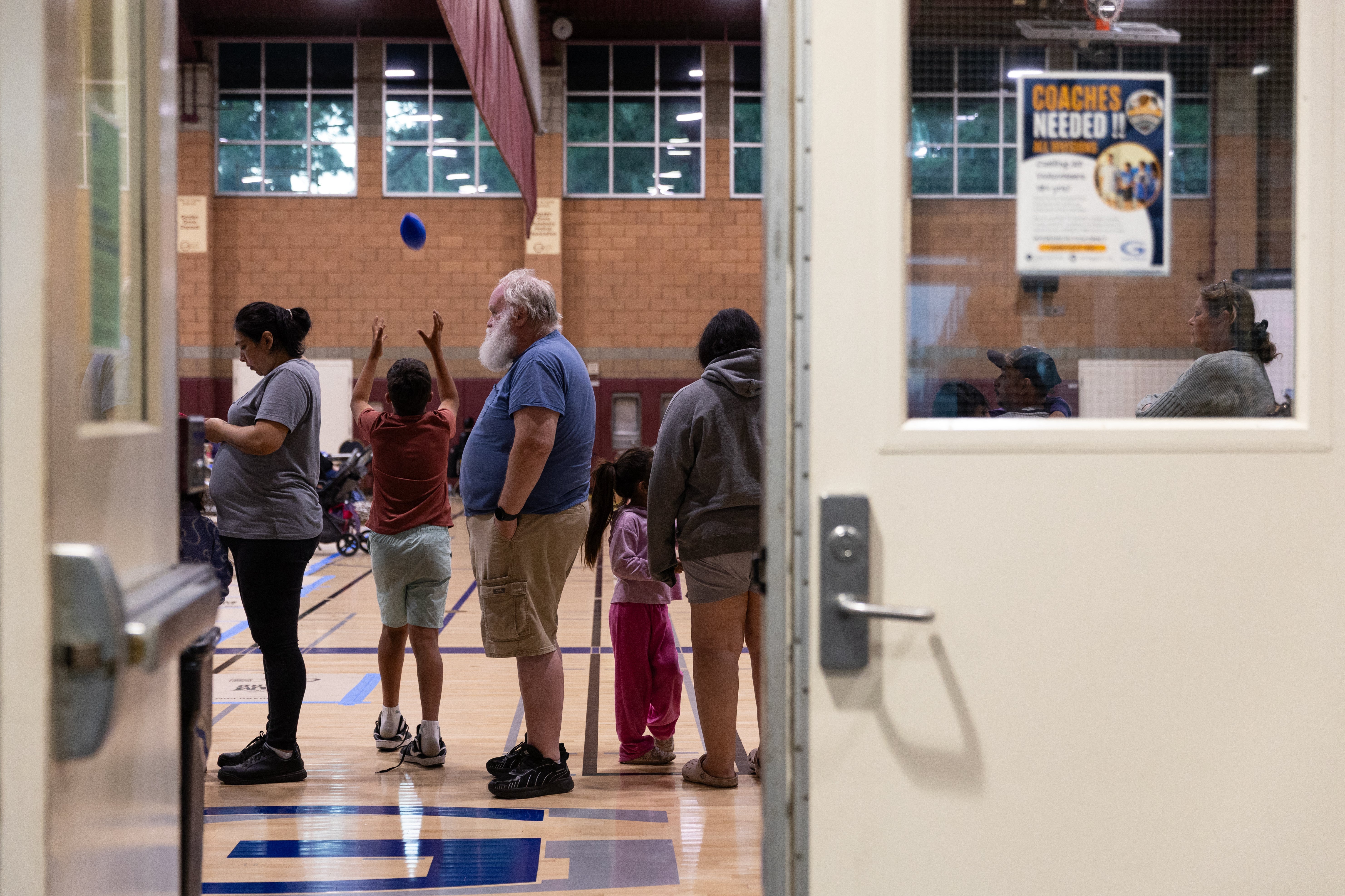 Evacuees wait in line for food after a chemical leak from a large storage tank threatened residents in Garden Grove, California on May 22. Nearly 50,000 people have been evacuated