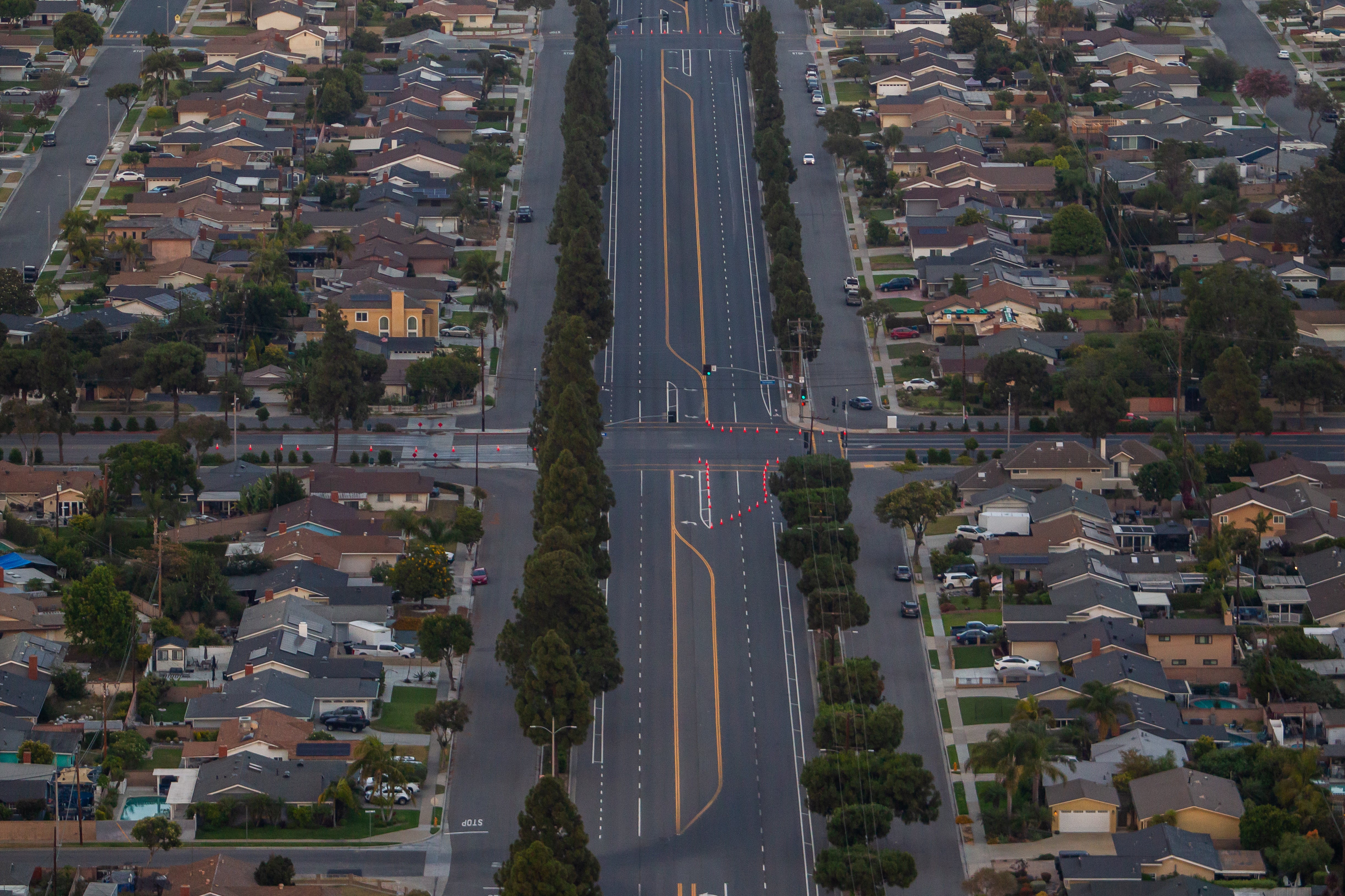 An aerial view of traffic cones on closed streets while water is sprayed onto an overheated 34,000-gallon tank at GKN Aerospace