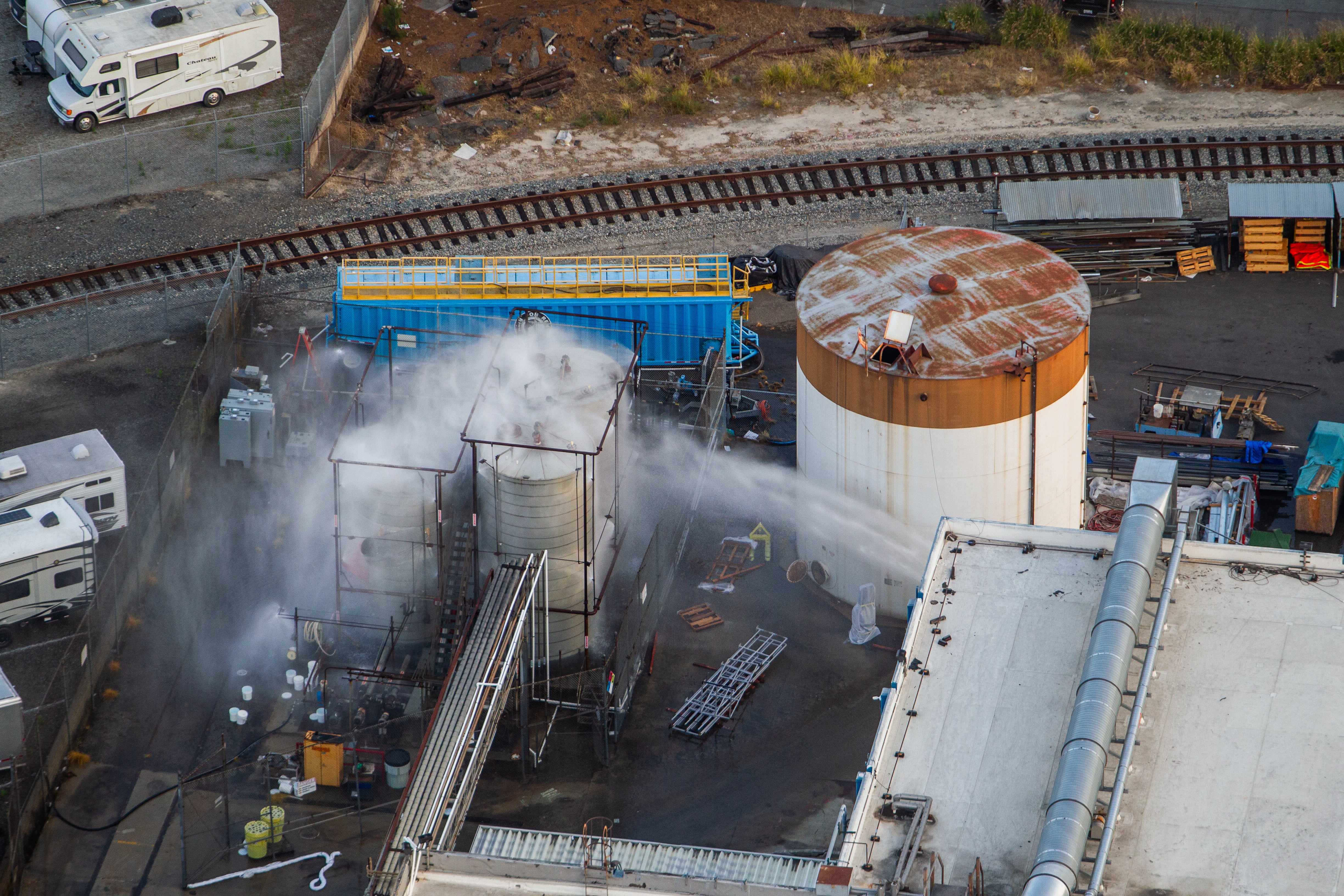 Officials said Sunday that the discovery of a pressure-relieving crack in the leaking industrial tank at the GKN Aerospace facility in Garden Grove (pictured) could change the strategy for handling the crisis and finding a solution