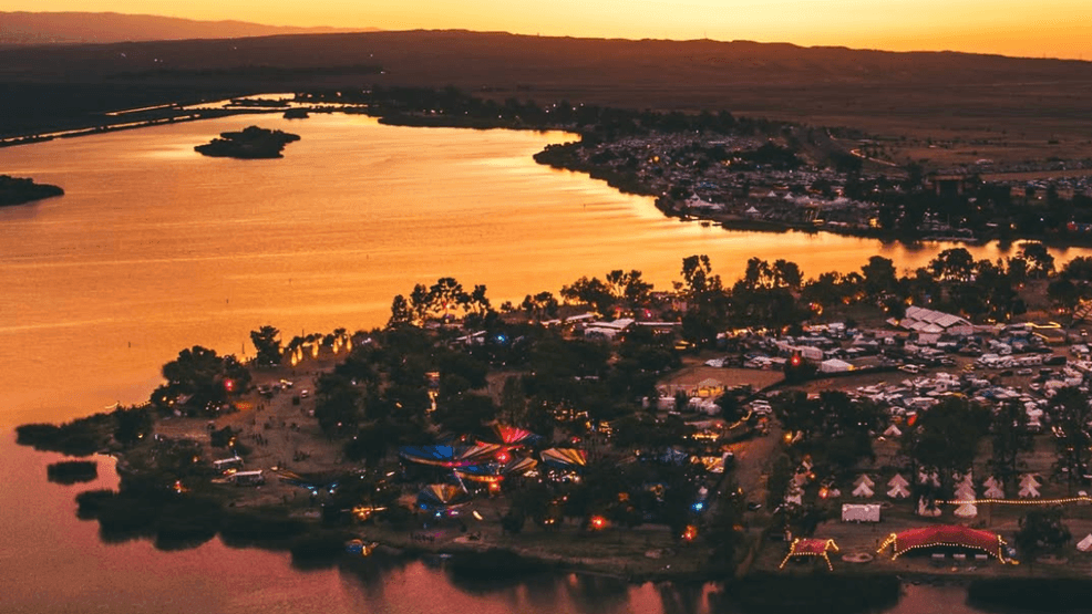 Sunset photo of Lightning in a Bottle festival grounds at Buena Vista Aquatic Recreation Area in Kern County, Calif. (Instagram/libfestival/thedolab)