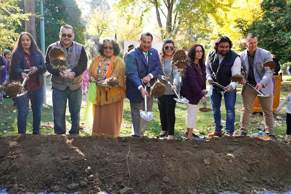 Assemblyman James Ramos and representatives of several Sacramento area tribes shoveling dirt during a groundbreaking ceremony for a Native American monument. AP