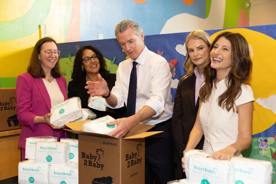 California Gov. Gavin Newsom boxes diapers as part of the Baby2Baby nonprofit scheme. Getty Images for Baby2Baby
