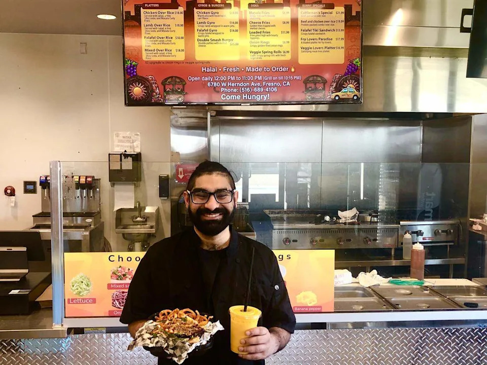 Shaan “Sunny” Singh, a native New Yorker who opened up a halal New York City street-cart like restaurant, showcases a double patty smashburger and a mango lassi offered at his place Big Apple Platters NYC. However, Singh’s restaurant, which was located inside a 76 gas station in northwest Fresno, closed due to financial struggles. Singh said road construction along Herndon Avenue prevented him from making sales for almost two weeks.