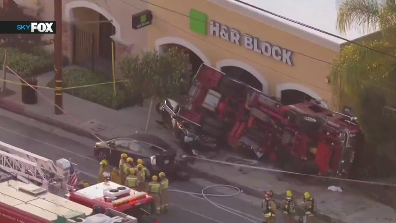 Firetruck flips over in Sunland