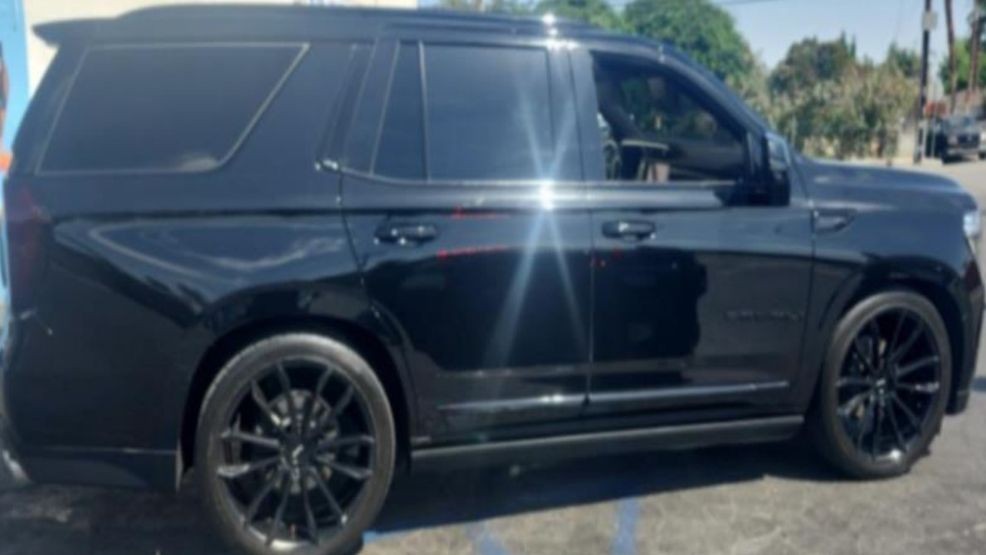 A man was arrested for impersonating an officer after police say he allegedly used flashing red and blue lights in a black GM Yukon to pull over a driver. PHOTO: BPD
