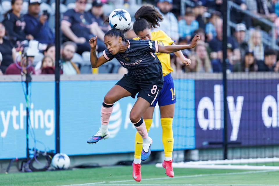 Ary Borges #8 of Angel City FC goes for a heading during an NWSL match against the Utah Royals on May 2, 2026 at BMO Stadium in Los Angeles, California.