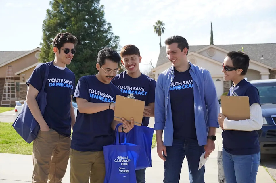 Johnathon Burrows, second from right, is the co-founder of the Youth Save Democracy PAC, which aims to mobilize, educate and empower young voters. Johnathon Burrows, second from right, is the group’s cofounder.