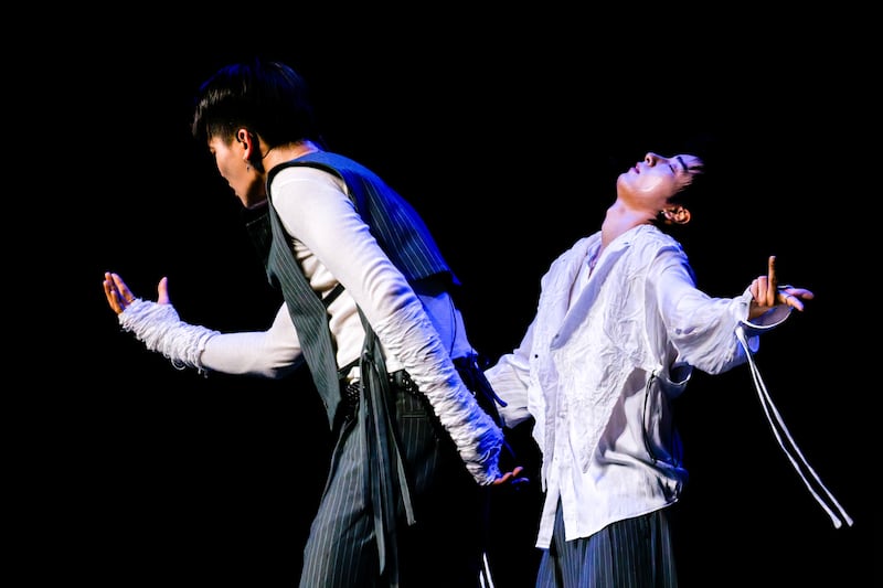 K-pop artists dancing on stage