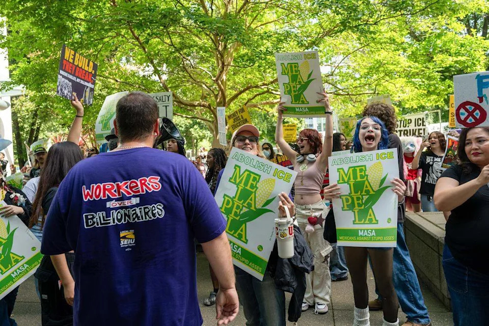 Hundreds of demonstrators participate in the “A Day Without Immigrants” 20th anniversary march from Southside Park through downtown Sacramento to the John E. Moss Federal Building in Sacramento on Friday.