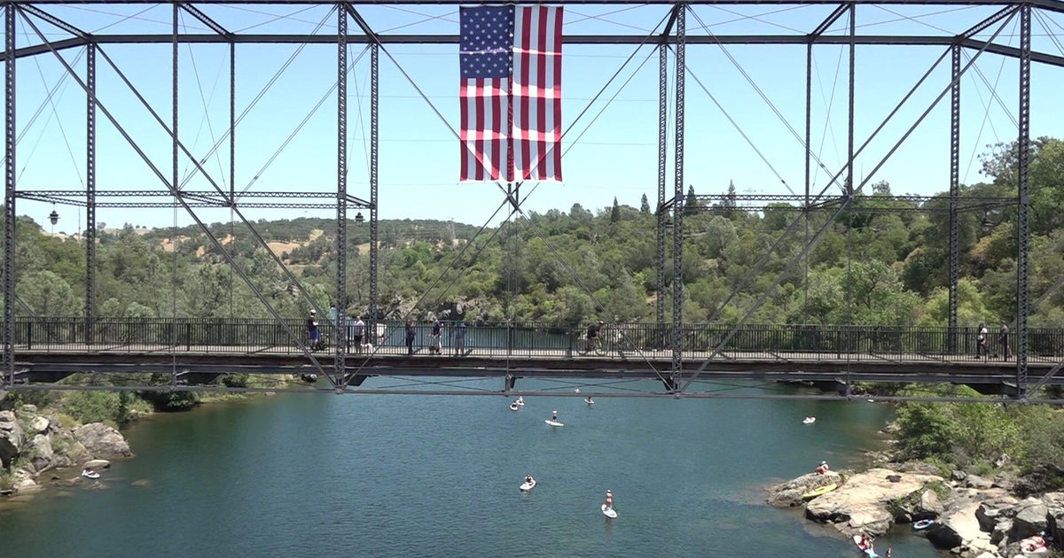 Folsom volunteer raises American flag on Rainbow Bridge