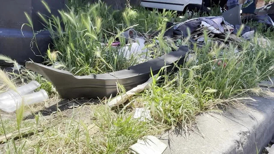 <div>Scattered car parts at corner of Plymouth Street and 86th Avenue in East Oakland. May 21, 2026</div>