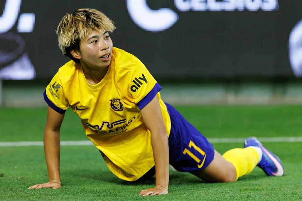 Mina Tanaka #11 of the Utah Royals falls down during an NWSL match against Angel City FC on May 2, 2026 at BMO Stadium in Los Angeles, California.