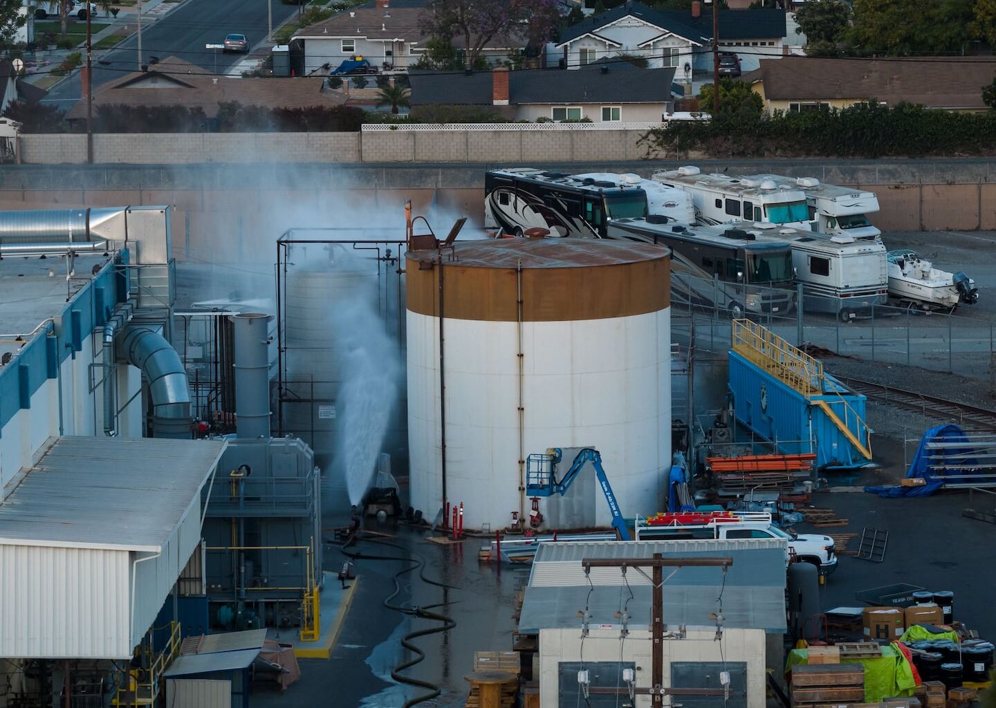 Water is sprayed on a tank that overheated at an aerospace plant in Garden Grove, Calif., on May 22.