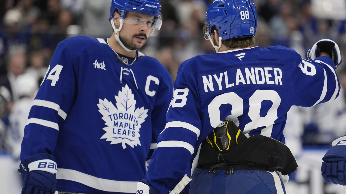 Toronto Maple Leafs forward William Nylander (88) and forward Auston Matthews (34) discuss a play against the Tampa Bay Lightning during the first period at Scotiabank Arena