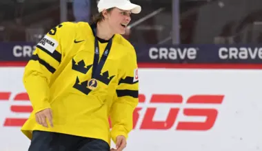 Sweden forward Ivar Stenberg (15) is all smiles after defeating Czechia in the final of the 2026 IIHF World Junior Championship ice hockey tournament at Grand Casino Arena