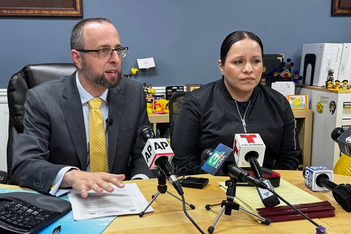 Patrick Kolasinski, attorney for Carlos Ivan Mendoza Hernandez, accompanied by his client's girlfriend, Cindy, speaks at a news conference in Modesto, Calif., on April 8, 2026.