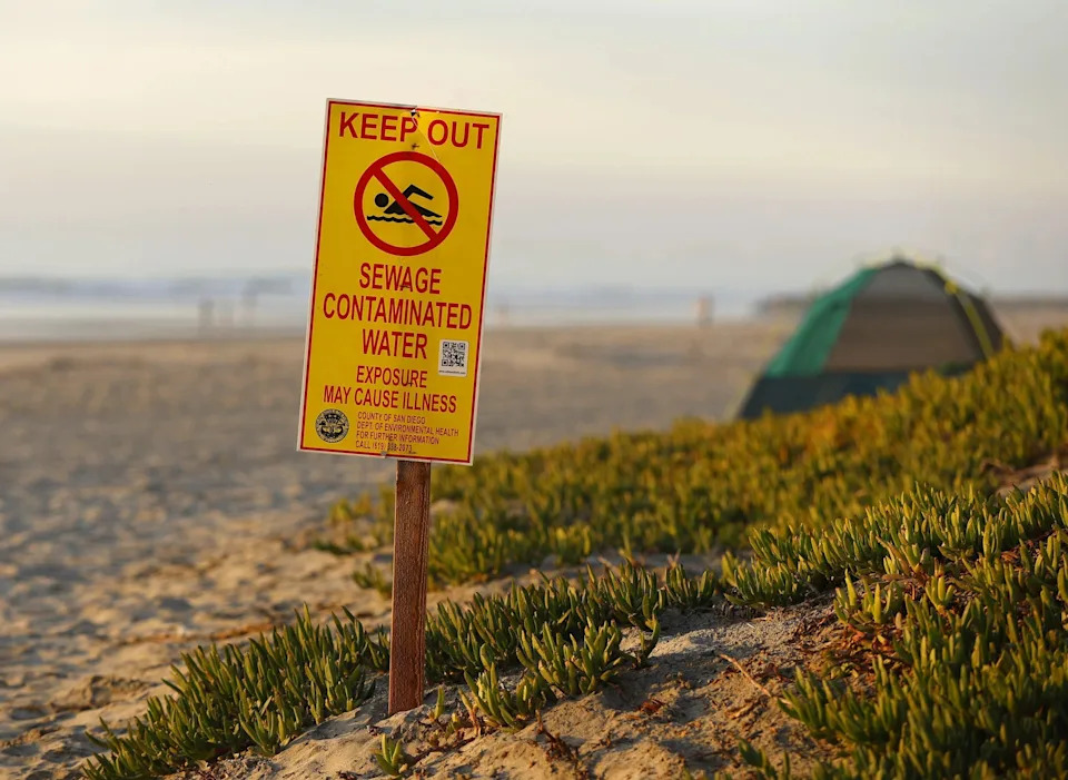 San Diego CA - December 22: A water contamination sign warns beach goers about high bacteria in the water in Imperial Beach on Thursday, December 22, 2022.