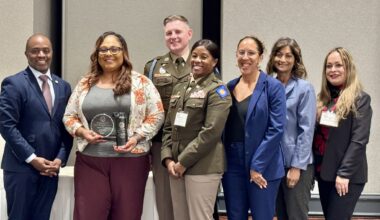 From left, State Superintendent of Public Instruction Tony Thurmond, Raelene Velasquez, Command Sgt. Maj. Richard Aller, Sunburst Youth Academy Director Lt. Col. Sarah Rambo, Principal Dinah Ismail, OCDE Executive Director of Special Education Dr. Amita Cloke and OCDE Manager of Human Resources Support Services Lorena Villa pose for a photo during the 2026 California Classified School Employees of the Year recognition ceremony in Sacramento.