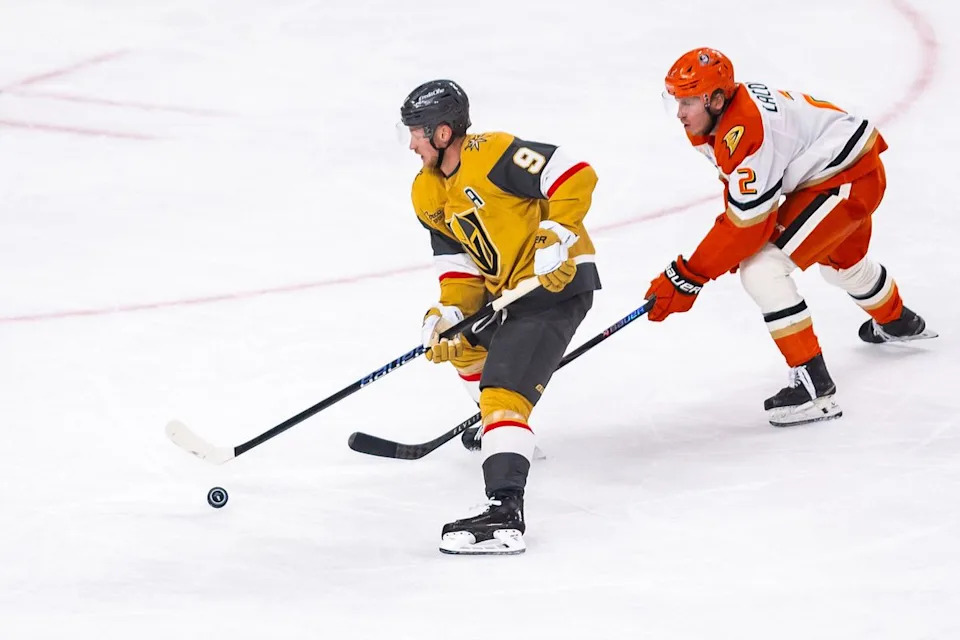 Vegas Golden Knights center Jack Eichel (9) skates past Anaheim Ducks defenseman Jackson LaCombe (2) during game 2 of a NHL playoff game between the Vegas Golden Knights and the Anaheim Ducks, Wednesday May 6, 2026 in Las Vegas, Nev.